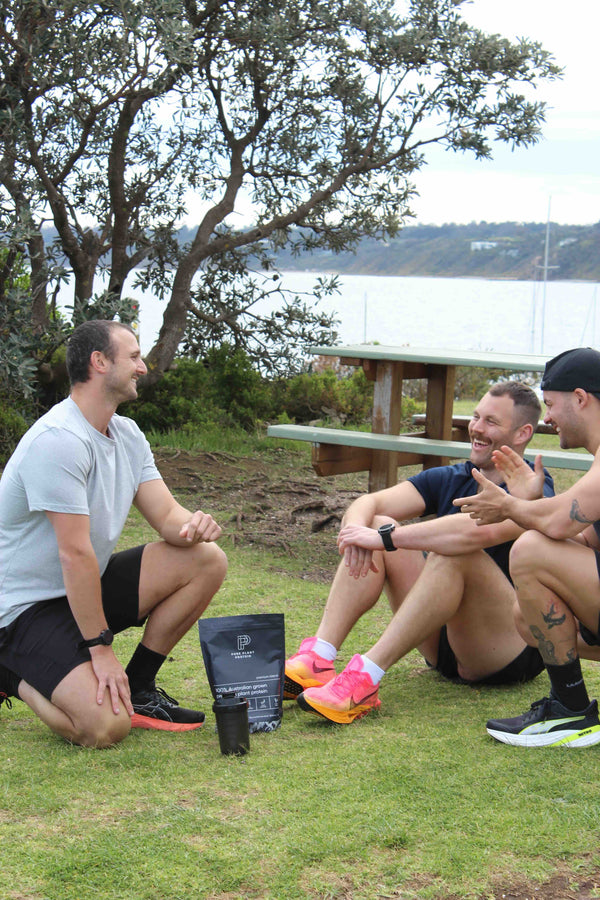 Unflavoured Pure Plant Protein in the park with athletes