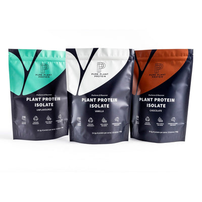 Three packages of Pure Plant Protein plant protein isolate in different flavours on a white background.
