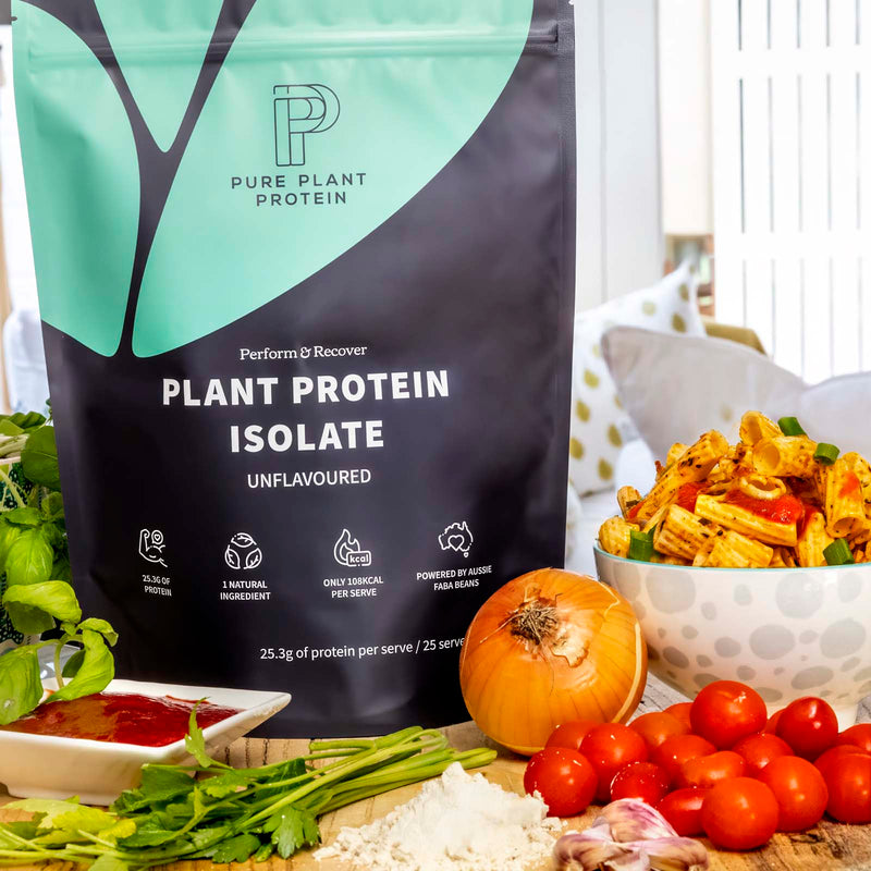 Bag of Pure Plant Protein plant protein isolate with vegetables on a table